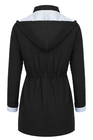 Back view of women's water resistant windbreaker jacket with hood and striped inner lining in Halloween collection