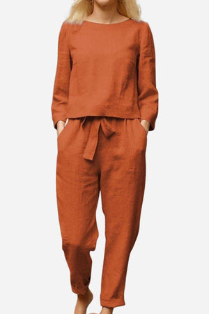 Retro monochrome linen two-piece set in rust color with long sleeves and tied waist pants