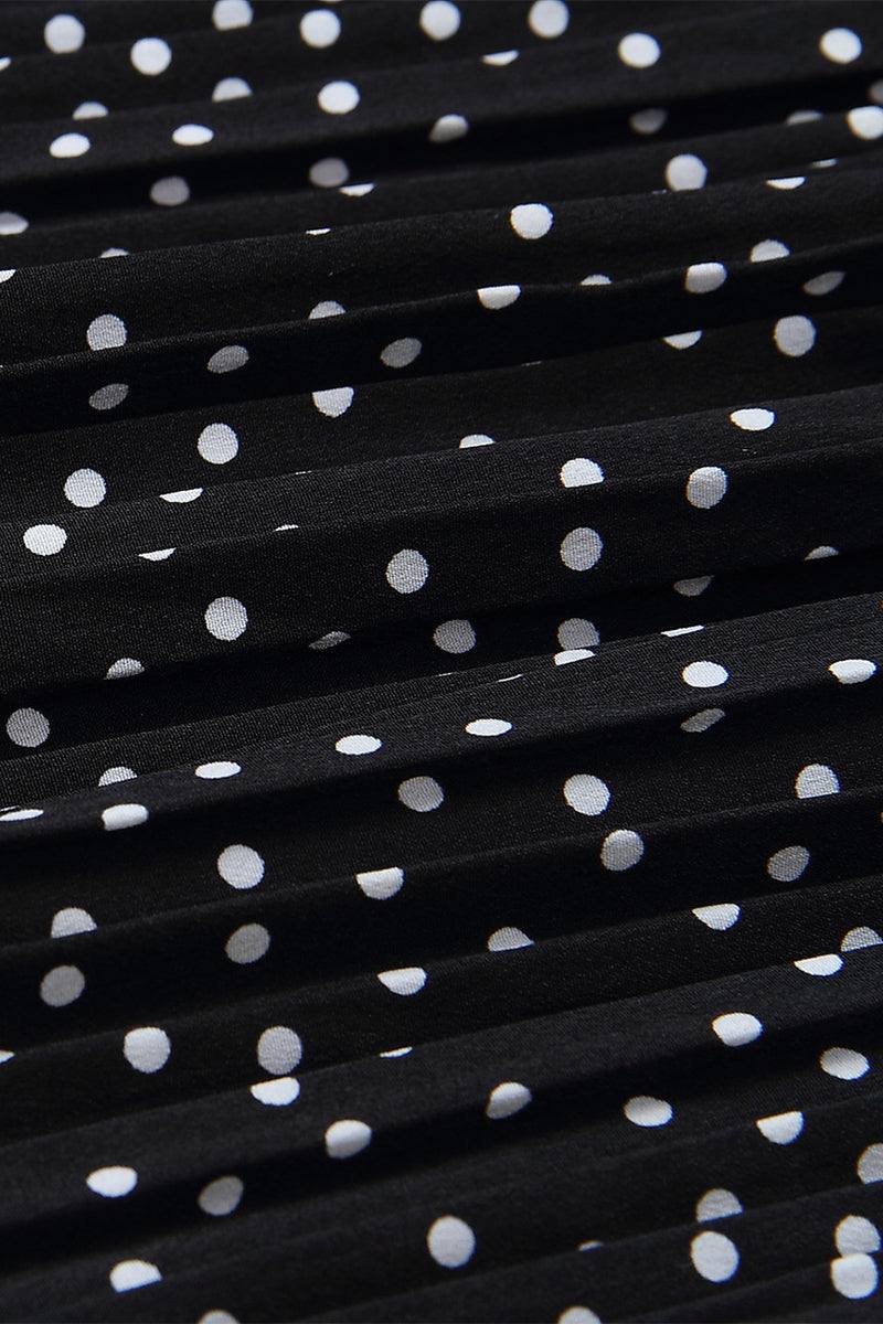 Close-up of black pleated fabric with white polka dots from Effortlessly Chic Polka Dot Pleated Skirt Set