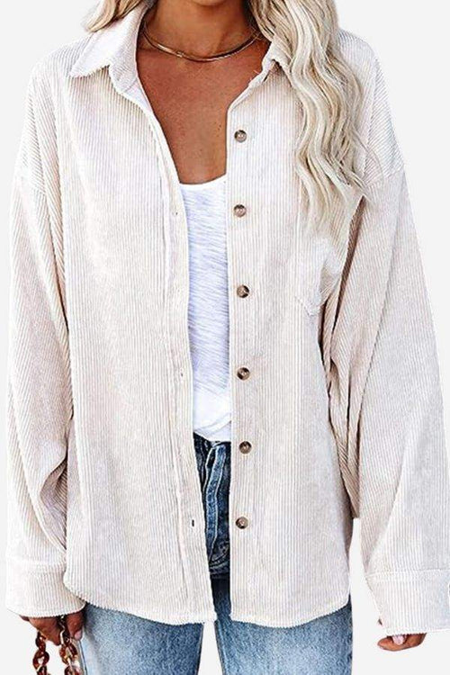 Sleek suede oversized button-down shirt in light beige with front buttons and relaxed fit