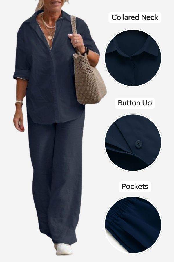 Woman wearing navy relaxed shirt and trousers two-piece set with collared neck, button-up shirt, and elastic waist pockets.