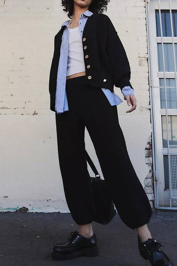 Two-piece knitwear relaxed co-ord set in black with buttoned cardigan and cuffed pants for casual chic style