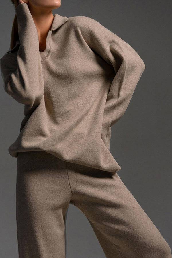 Plush & Preppy camel two-piece set featuring a knitted pullover with polo collar and wide-leg pants for comfortable travel and leisure.