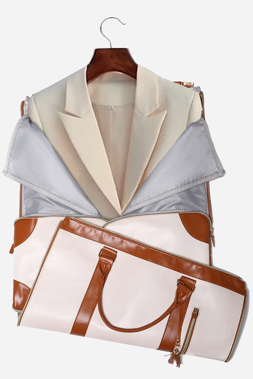 No-Wrinkle Foldable Travel Bag in beige and brown PU leather holding a cream blazer on hanger, designed for wrinkle-free garment carrying and travel organization
