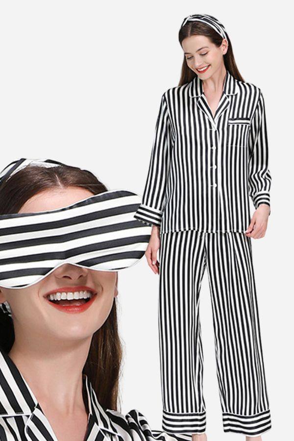 Woman wearing 100% mulberry silk black and white striped long sleeve pajama set with matching headband and eye mask