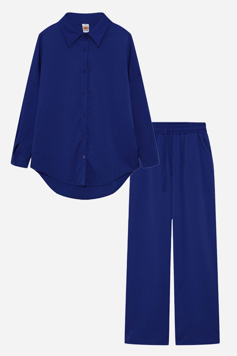 Professional smart two-piece set in navy blue with long-sleeve shirt and matching pants.