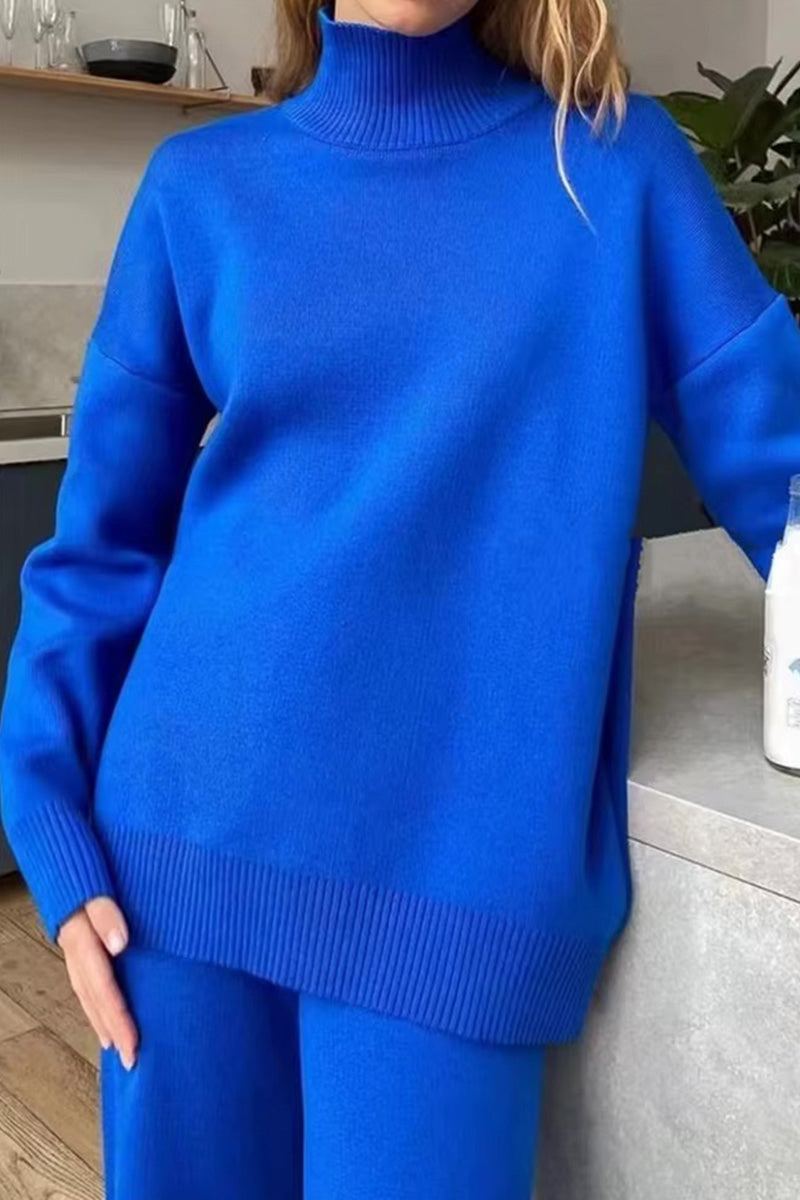 Blue knitted turtleneck two-piece set with oversized sweater and matching pants for cozy, stylish layering