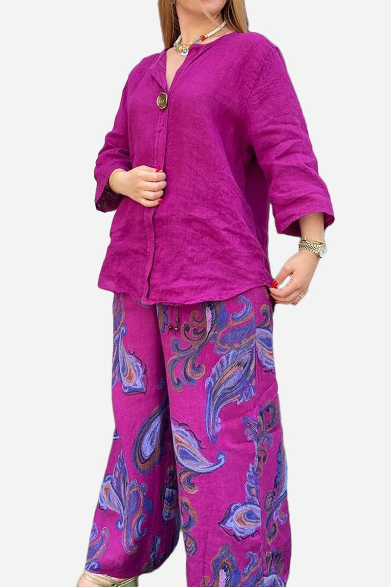 Vibrant Fusion Two-Piece Set with purple top and paisley patterned wide-leg pants for comfortable, stylish wear