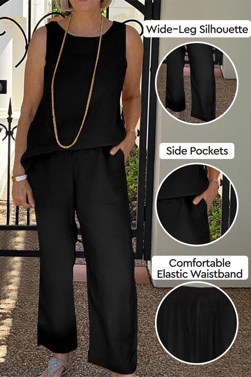 Woman wearing Sleek Silhouette black wide-leg coordinated set with elastic waistband and side pockets