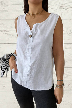 White 100% pure linen sleeveless cool comfort vest with V-neck and button detail, worn with black pants.