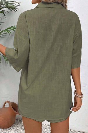 Back view of woman wearing olive green Coastal Linen Cotton two-piece set top with short sleeves and textured fabric.