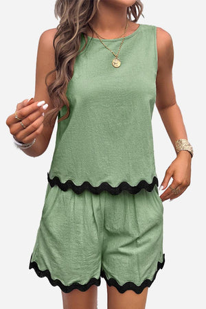 Flattering coastal scallop two-piece set in green with black scalloped hem, lightweight and breathable summer outfit