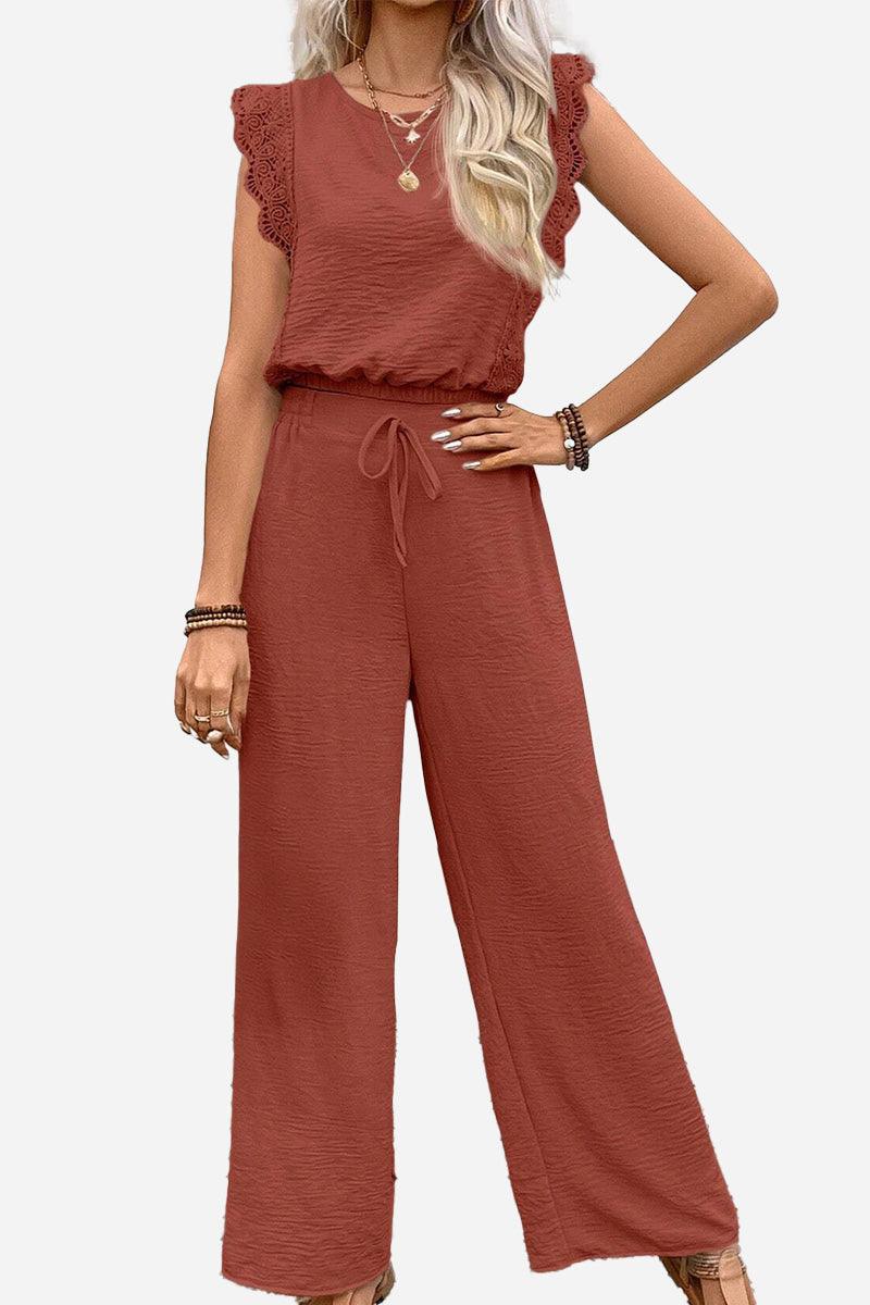 Elegant two-piece set with lace detail in rust color, featuring a sleeveless top and wide-leg pants.