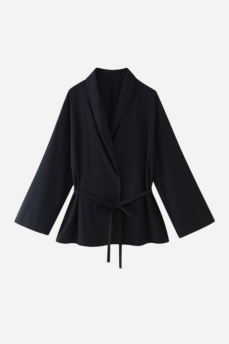 Black wide-leg pants and matching wrap top mix-match lounge-to-travel set for versatile stylish comfort.