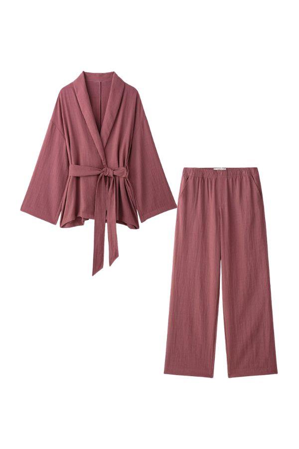 Dusty rose mix-match lounge-to-travel set with wide-leg pants and belt-tied top.