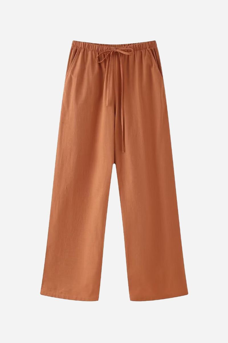 Rusty orange wide-leg pants from versatile Mix-Match Lounge-to-Travel Set, comfortable and stylish for travel and casual wear.