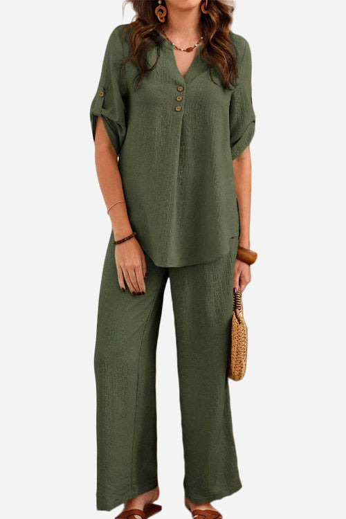 Wrinkle-free wide leg pants and button-front top set in olive green, travel-friendly polyester fabric.