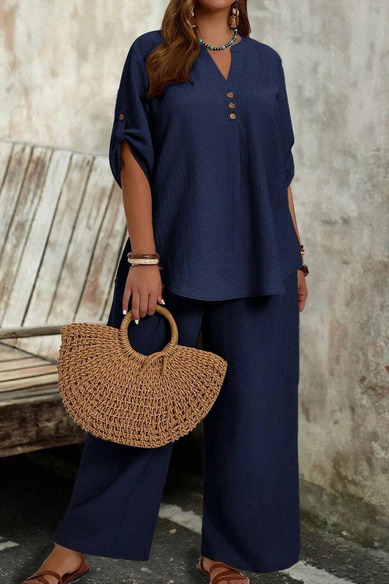 Navy wrinkle-free wide leg pants and button-front top travel set with rolled sleeves and casual fit