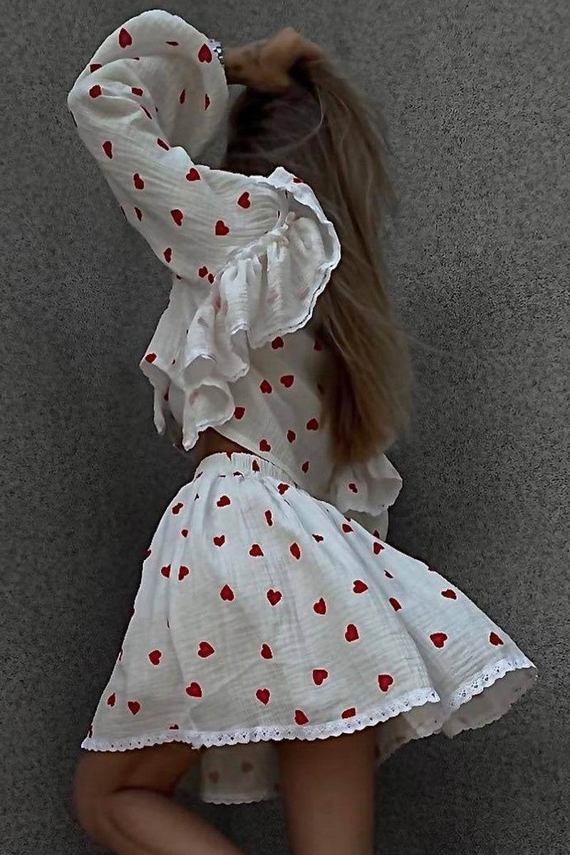 Sweet Countryside 100 Cotton white ruffled two-piece set with red heart prints, featuring a long-sleeve top and skirt.