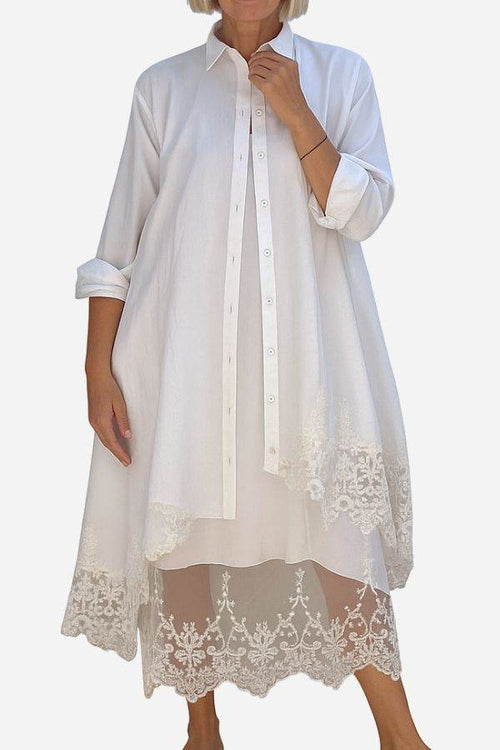 Woman wearing Villa Breeze Dress and Cardigan Set in white with lace trim detailing