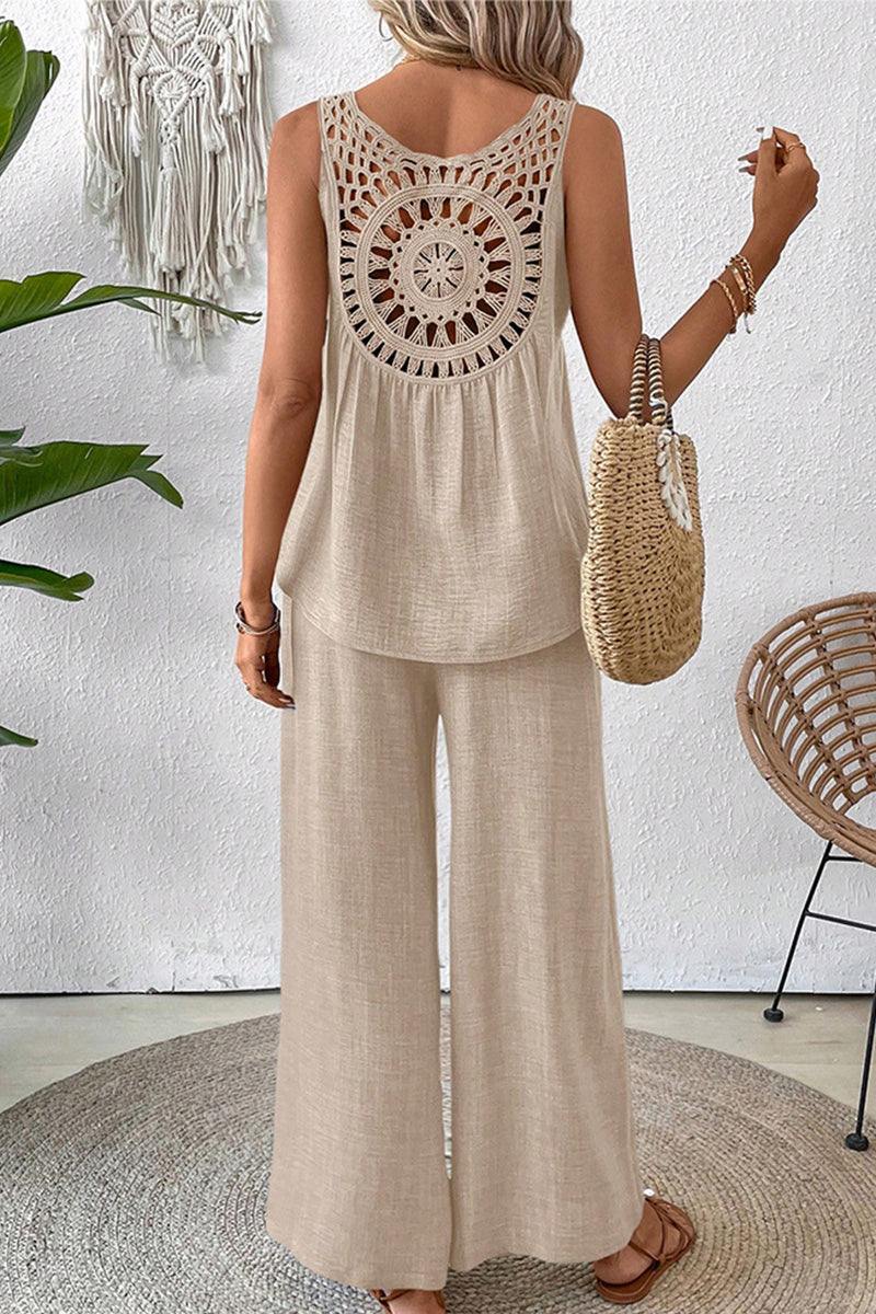 Woman wearing beige Dreamcatcher Crochet-Back sleeveless top and wide-leg palazzo pants two-piece set seen from the back.