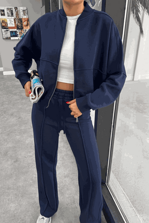 The Voyager Zip Set navy zip-front sweatshirt and wide-leg joggers travel outfit