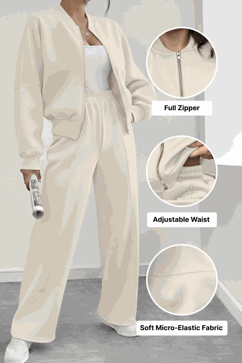 The Voyager Zip Set cream zip-front sweatshirt and wide-leg joggers with adjustable waist and soft micro-elastic fabric for comfortable travel and versatile style