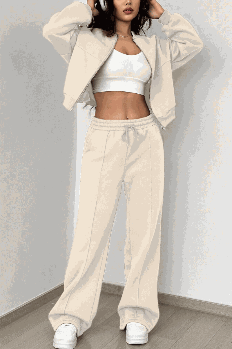 The Voyager Zip Set cream zip-front sweatshirt and wide-leg joggers travel outfit