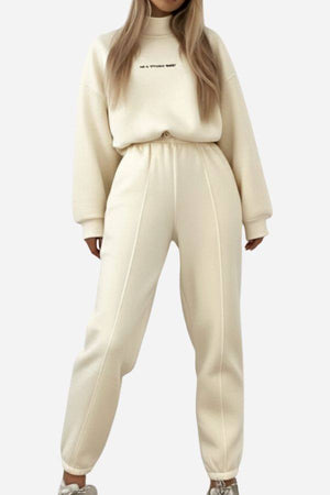 Storm Sweater Mock Neck athleisure set in cream with relaxed fit and adjustable waist