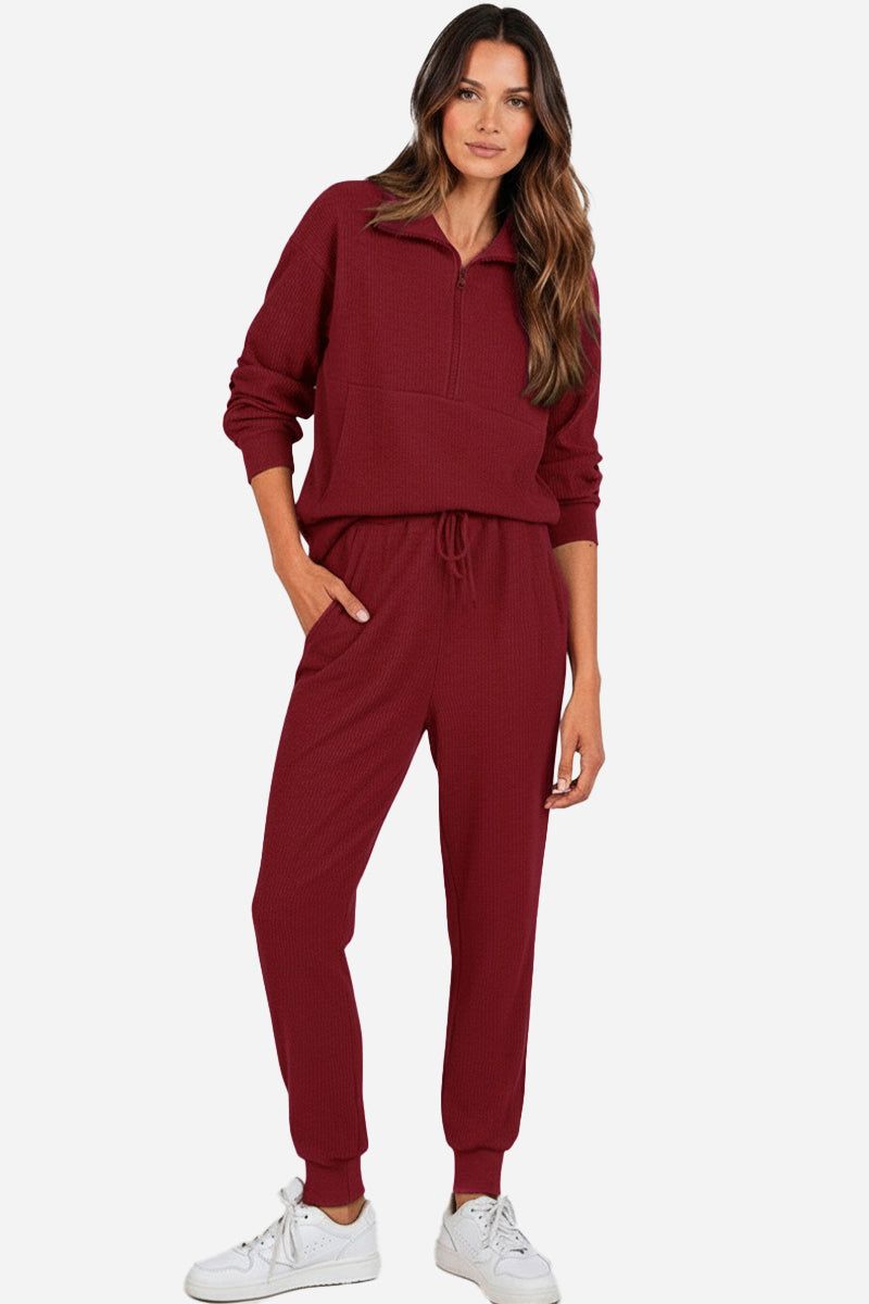 Unisex half-zip pullover and sweatpants set in burgundy, lightweight polyester blend, casual and comfortable loungewear for men and women