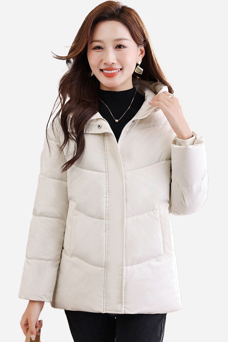 Woman wearing beige Everyday Warmth mid-length hooded coat with 5-layer thermal insulation and wind-resistant shell