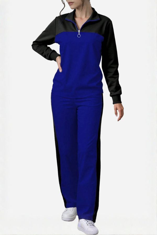 Woman wearing Colorblock Comfort Leisure Set in blue and black with half-zip stand collar and wide-leg pants