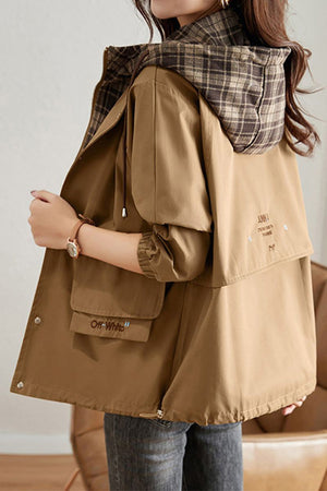 City Explorer Plaid Windbreaker jacket in tan with plaid hood lining, elastic cuffs, and relaxed fit for women