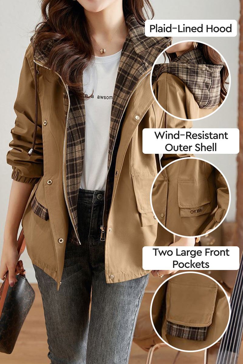 Women wearing brown City Explorer Plaid Windbreaker with plaid-lined hood, wind-resistant shell, and two large front pockets.