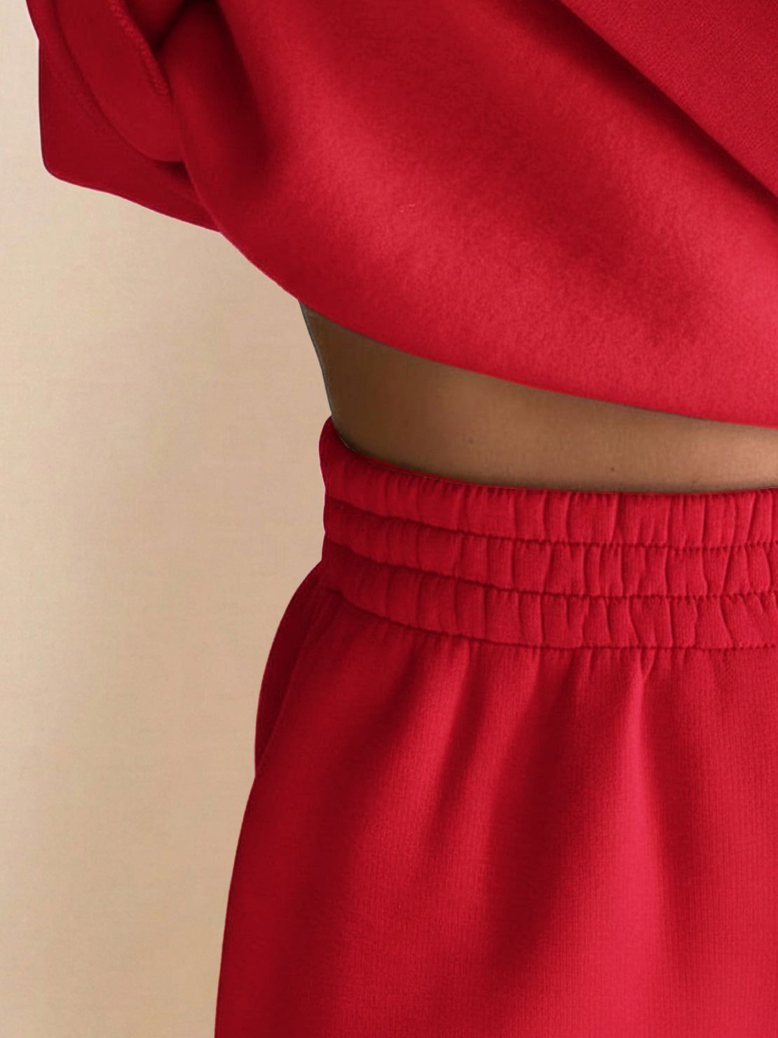 Close-up of red warm & easy two-piece set with elastic waistband and soft fabric