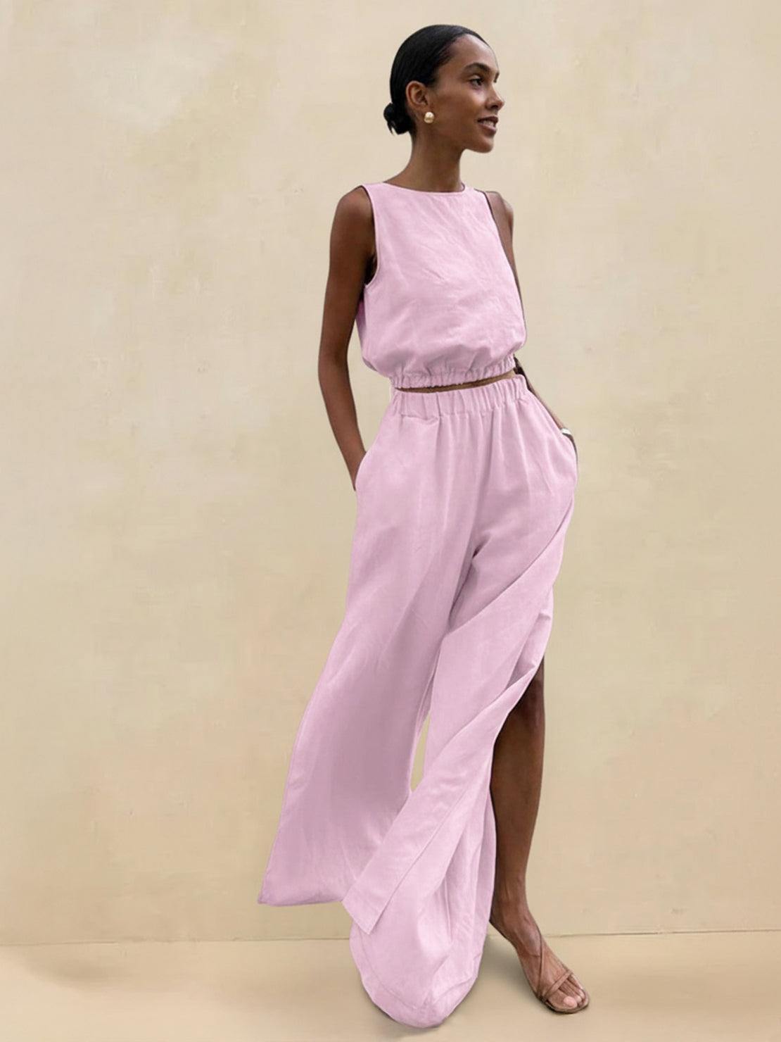 Lightweight linen-blend set with sleeveless top and wide-leg pants featuring elastic waistband and side slits for breathability