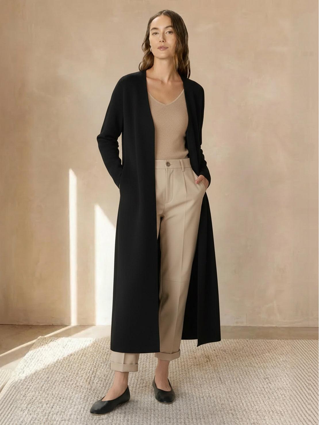 Long 100% Australian Merino Wool cardigan with open front and pockets, soft, warm, and breathable knit for layering.