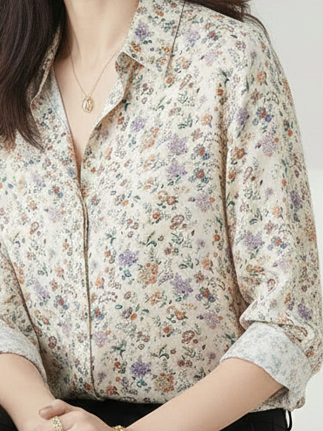 floral button-down shirt with long roll-up sleeves and relaxed hip-length fit