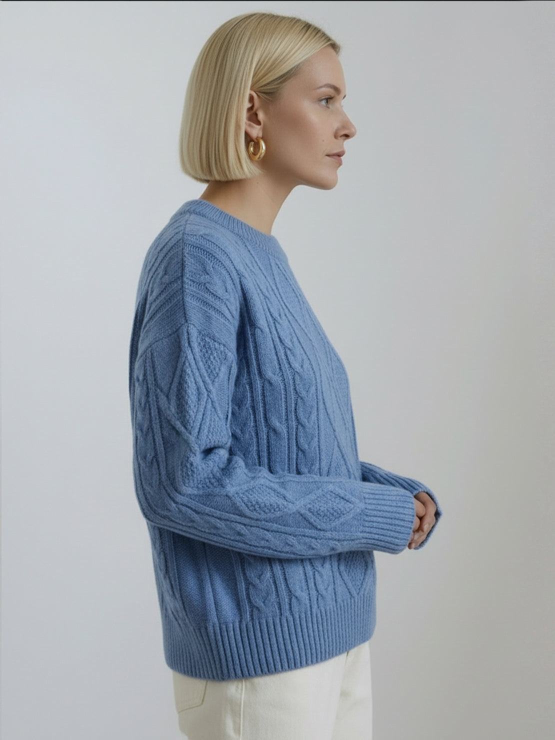 Oversized cable-knit crewneck sweater with dropped shoulders and ribbed trim in soft thick fabric