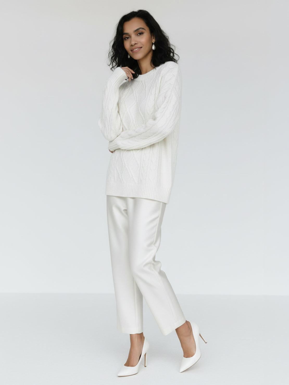 Oversized cable-knit crewneck sweater with dropped shoulders and ribbed trim in thick plush fabric