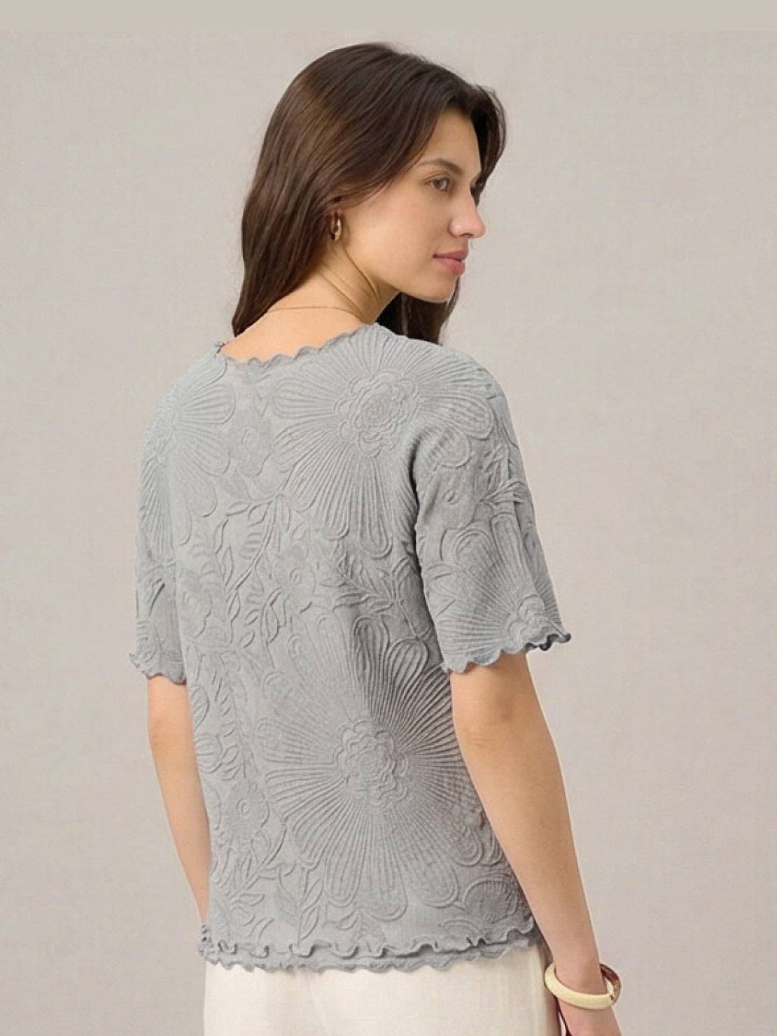Floral Jacquard Pleated Top with 3D floral texture and flutter sleeves in relaxed A-line silhouette