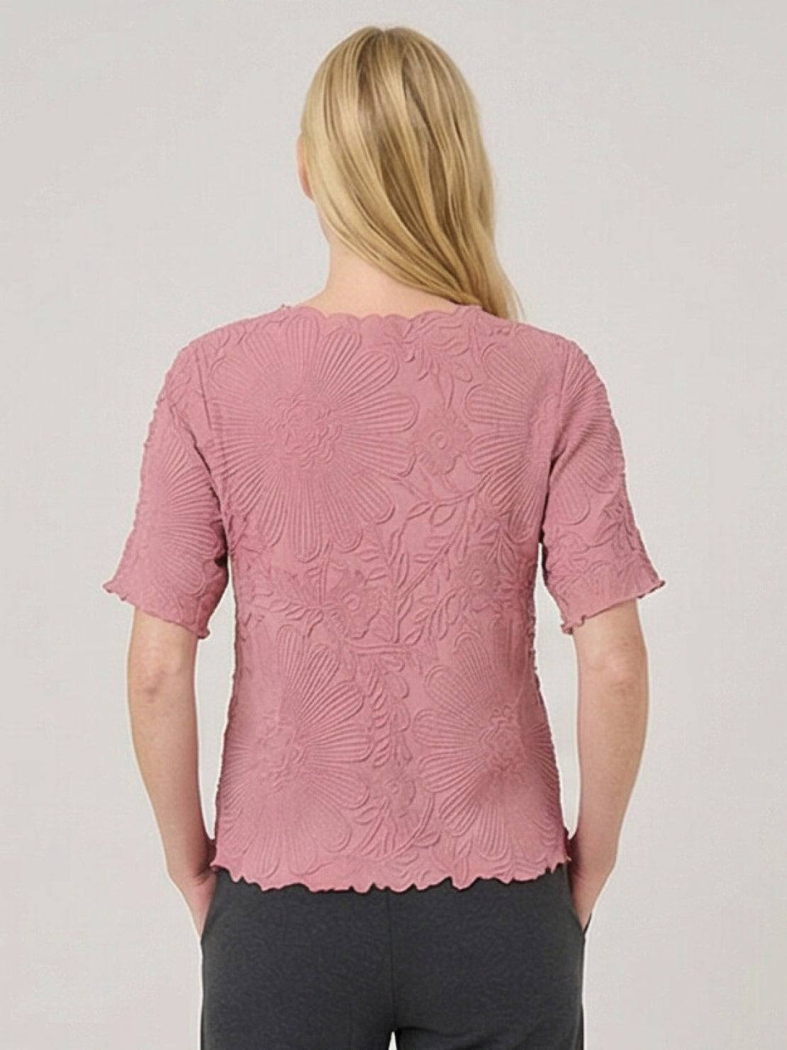 Floral jacquard pleated top with 3D floral texture, flutter sleeves, and relaxed A-line silhouette