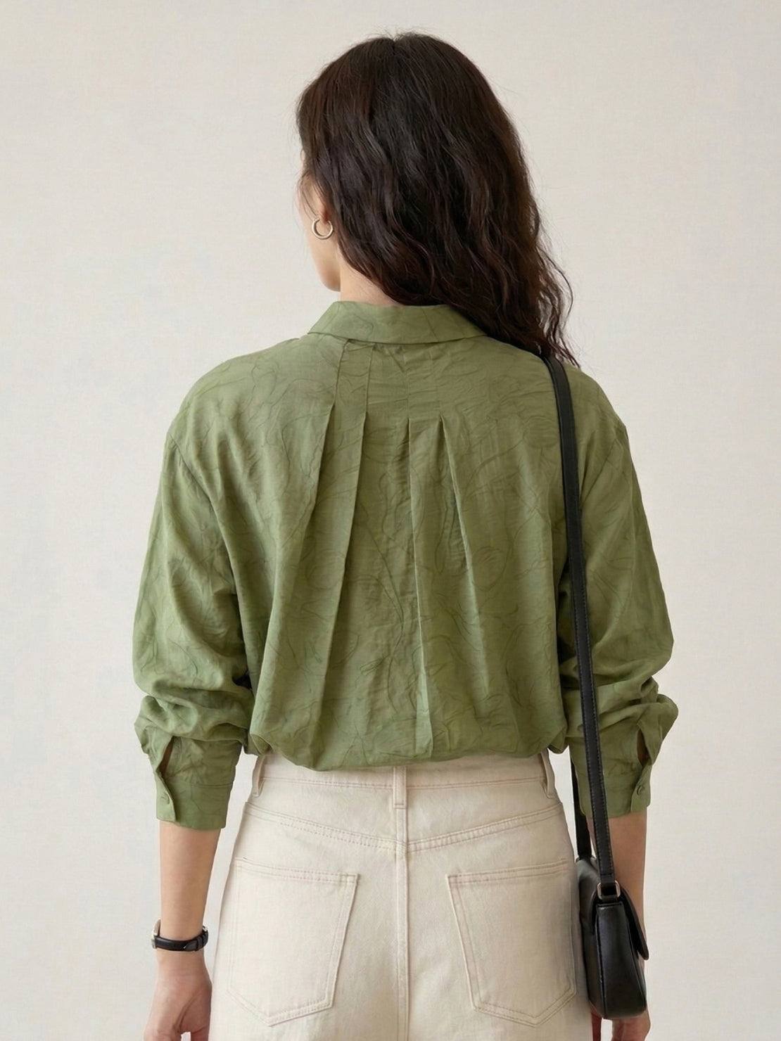 100% linen oversized jacquard shirt with relaxed fit and tonal leaf pattern texture