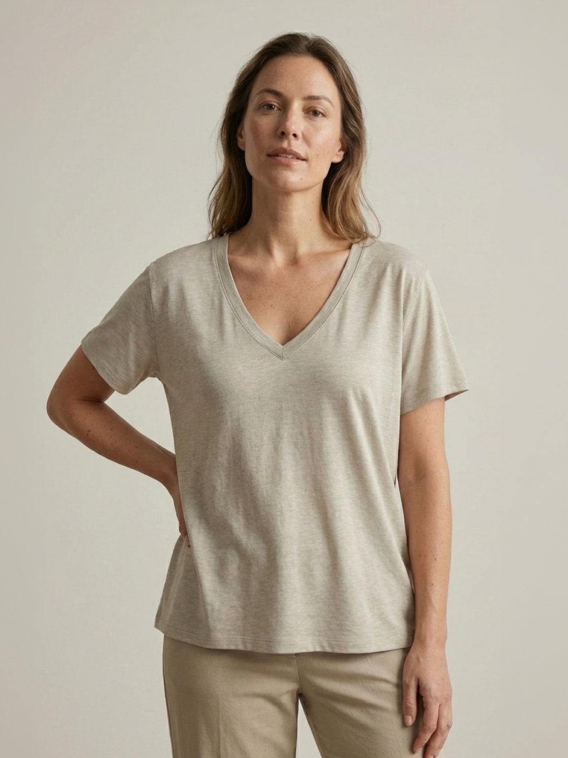 Woman wearing a breathable linen-bamboo V-neck tee with short sleeves and relaxed fit