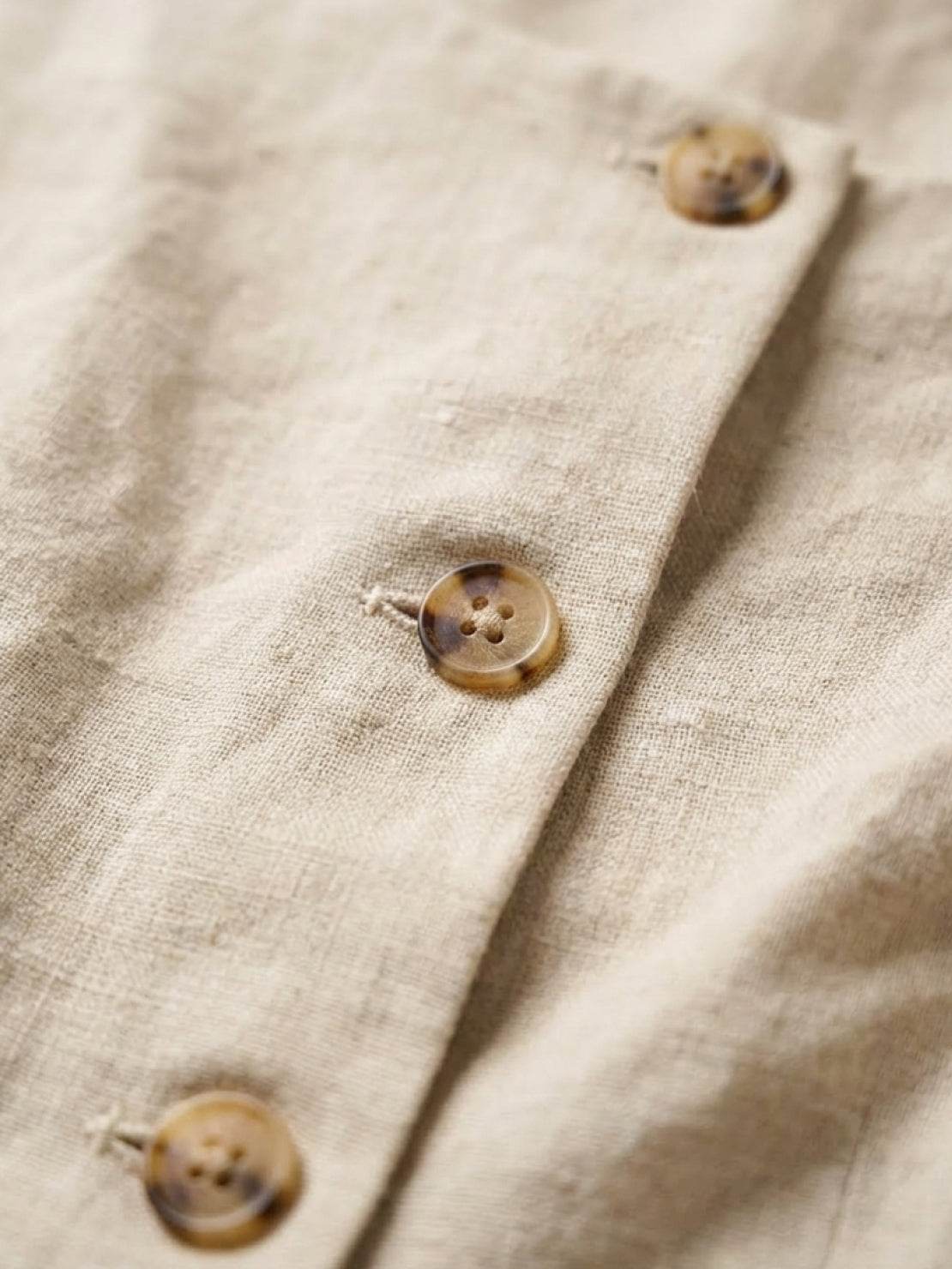 Women's 100% linen yarn-dyed vest with button-front and welt pockets