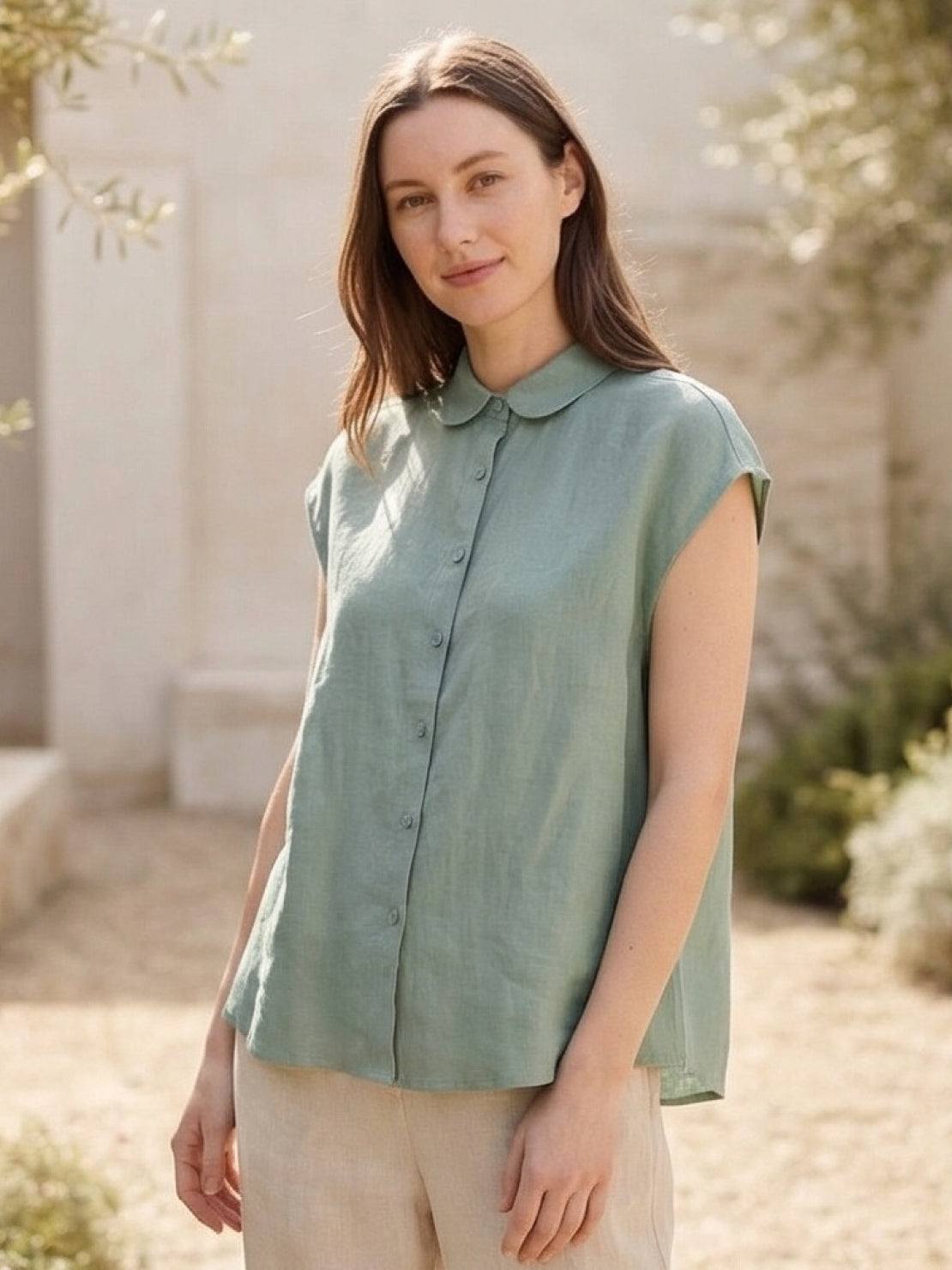 100% linen two-way button blouse with Peter Pan collar and cap sleeves in relaxed A-line design