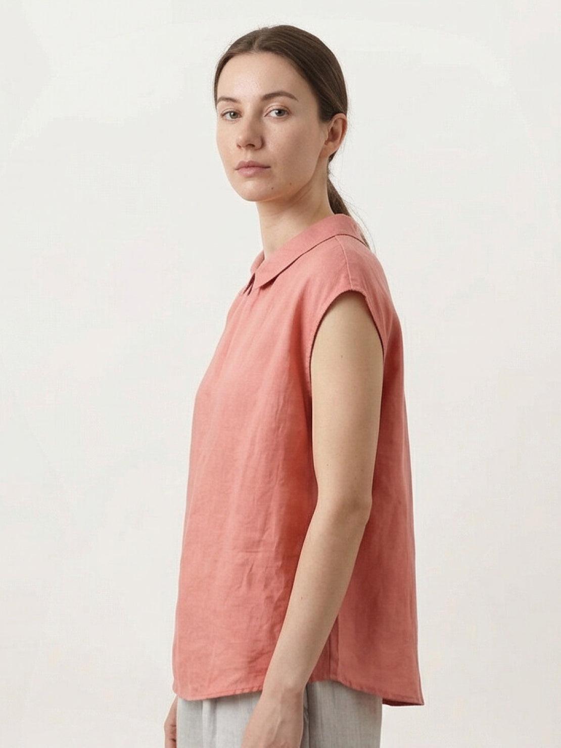 100% linen two-way button blouse with Peter Pan collar and cap sleeves in relaxed A-line silhouette