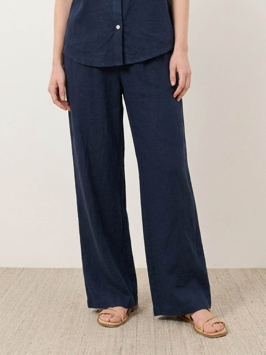100% cotton two-piece set with button-front top and wide-leg pants in soft solid colors