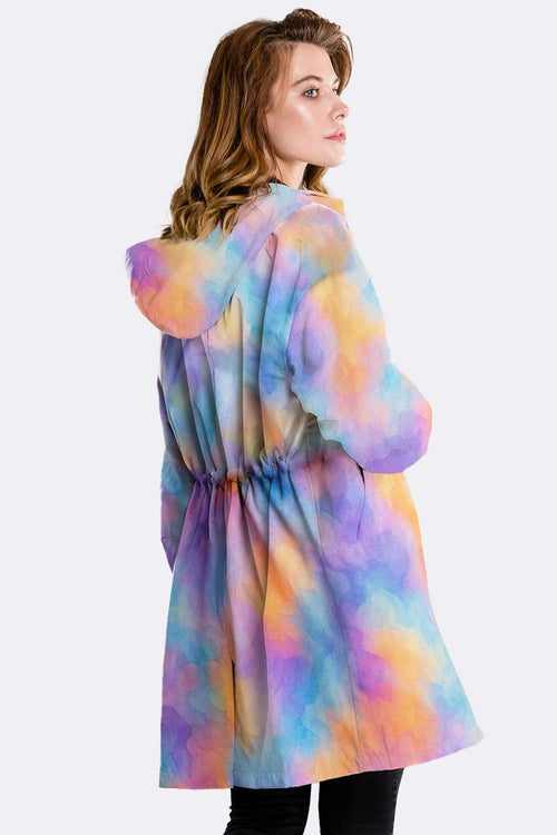Water Resistant Oversized Windbreaker in pastel tie-dye pattern with hood and adjustable waist worn by woman