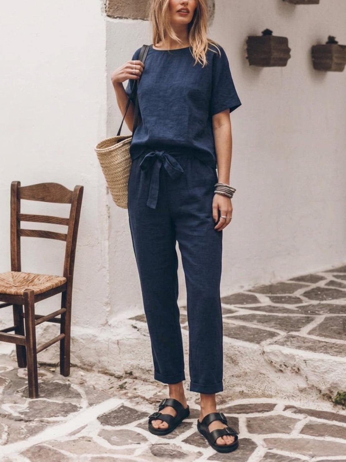 Cotton-linen set in monochrome two-piece with relaxed short-sleeve top and straight-leg pants displayed on white background